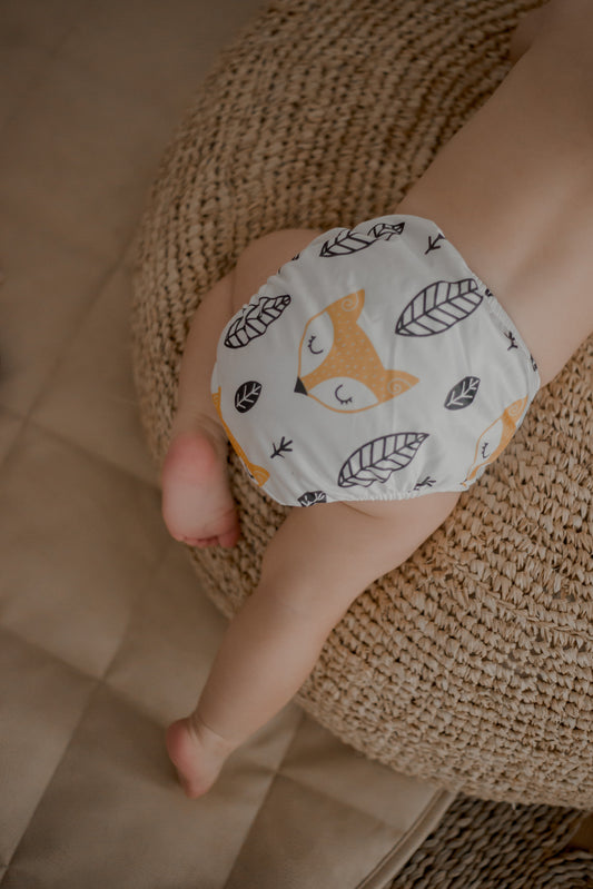 A baby in a cloth nappy