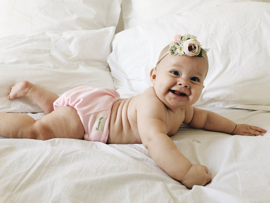 A baby in a cloth nappy