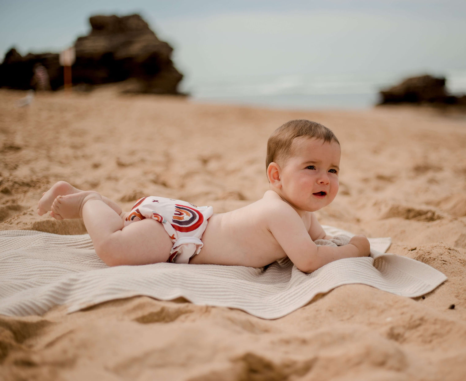  Baby boy on the beach in a My Little Gumnut Swim Nappy