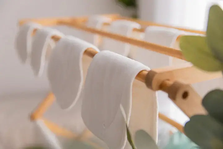My Little Gumnut Nappy Inserts drying on a clothes rack