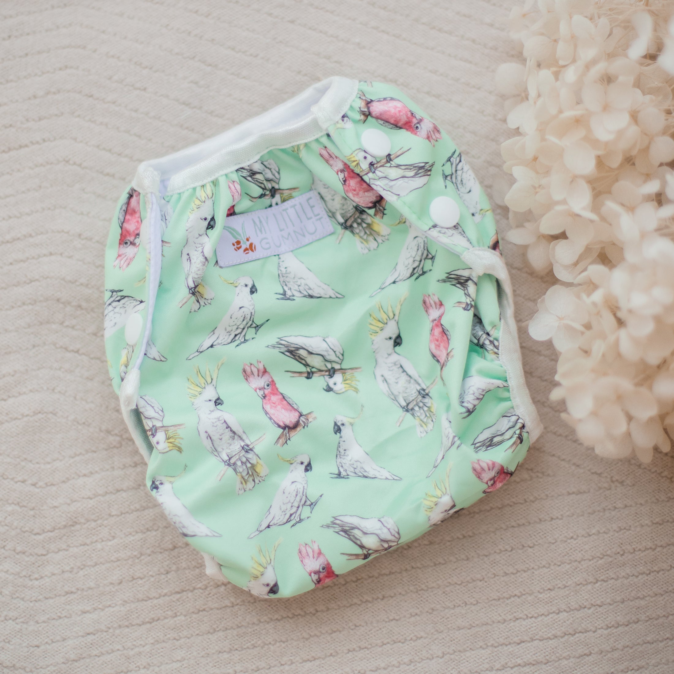 Reusable swim nappy. Cloth swimming nappy. water nappy. beach nappy. cockatoo nappy. my little gumnut.