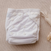 newborn cloth nappy by my little gumnut. austrlian reusable nappy. white baby nappy.