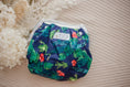 Load image into Gallery viewer, Tropical frog swimming nappy. Australian artist desgined swimming nappy. My little gumnut.
