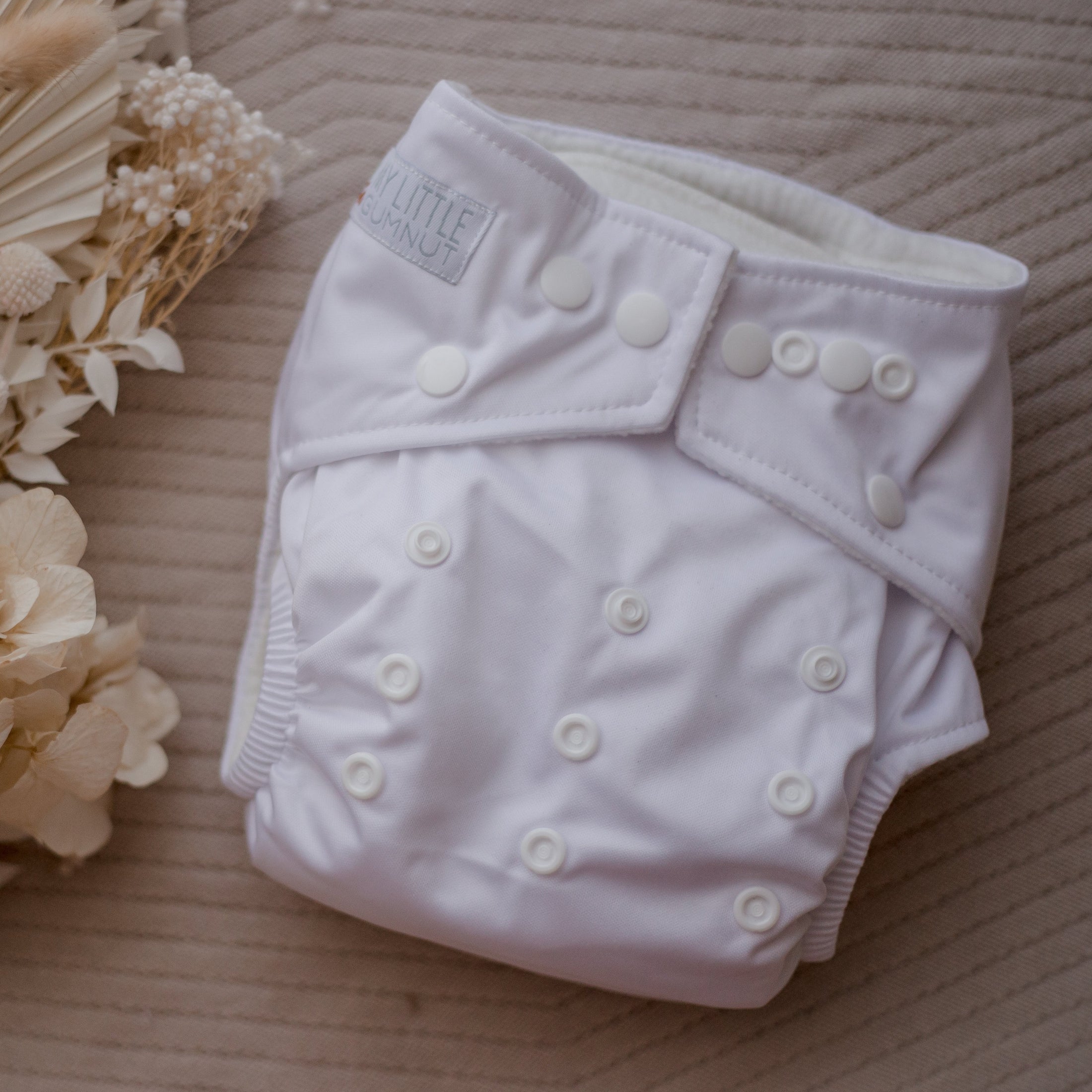 Modern cloth  nappies by my little gumnut. resuable cloth nappies. cloth nappies australia. ivory cloth nappy. white cloth nappy. traditional cloth nappy. 