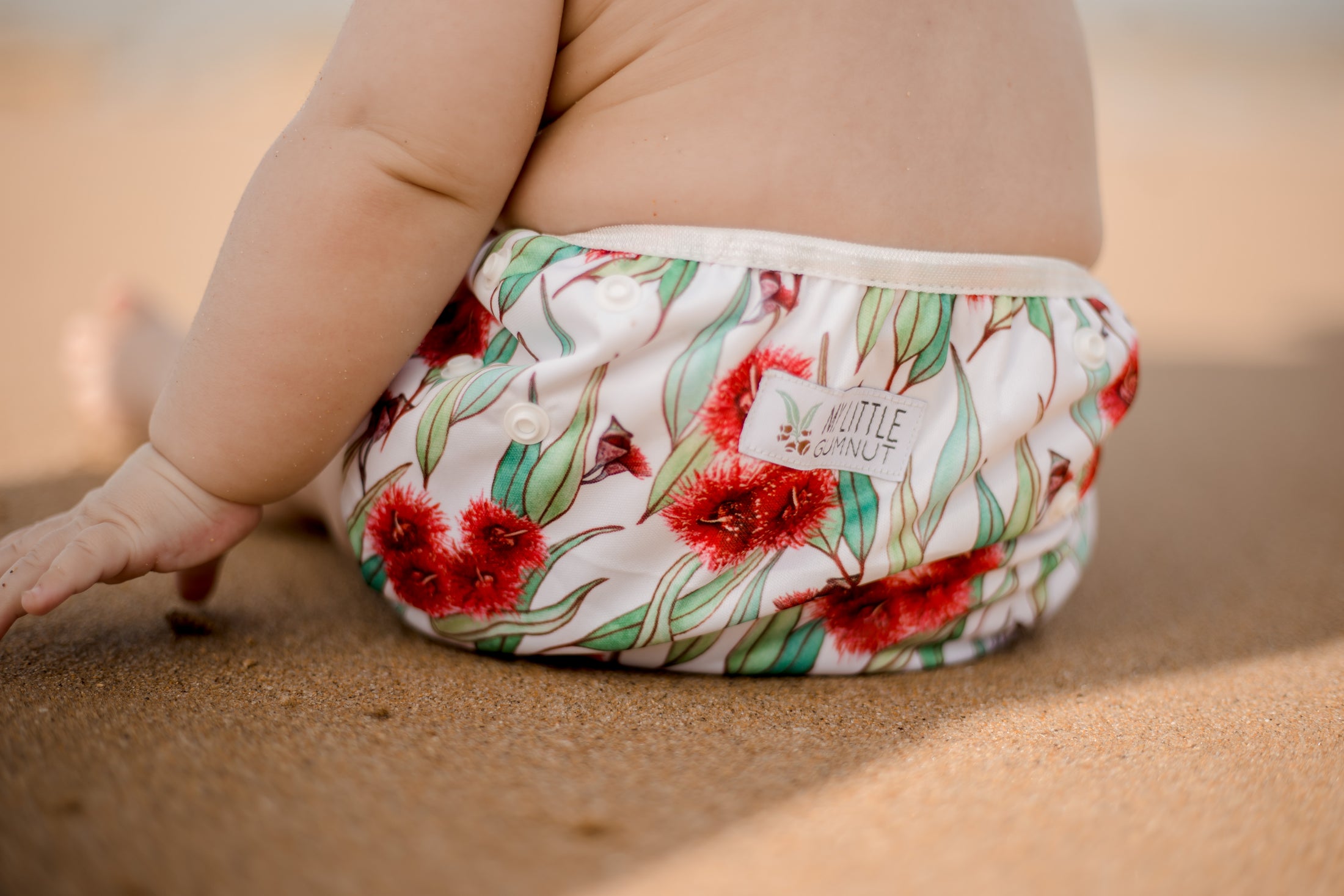 Beach baby in Flowering gum Australiana swim nappy. Reusable swimming nappy. My little gumnut. 